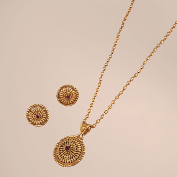 Elegant Floral Ruby Stone Pendant Set in Gold Finish | Bina Jewels
